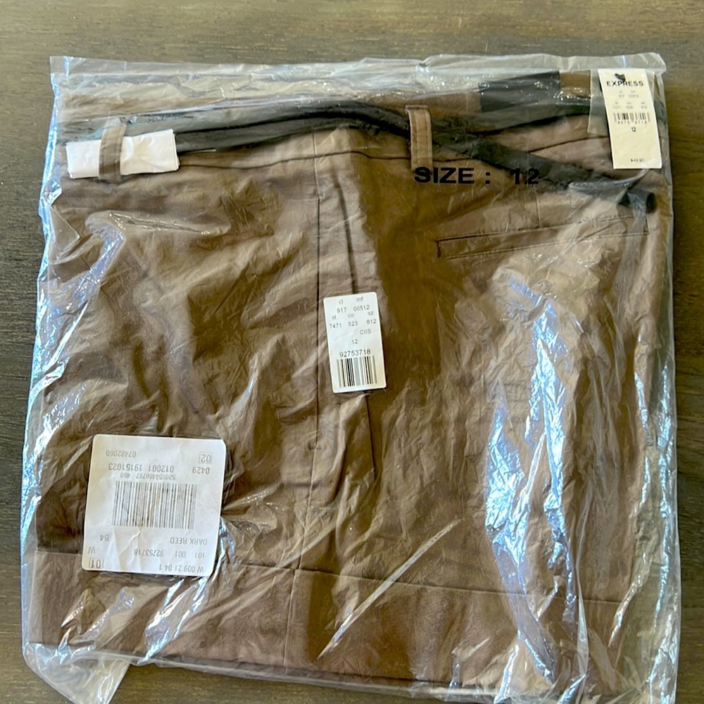 Express women’s shorts belt included, brand new in package! Size 12